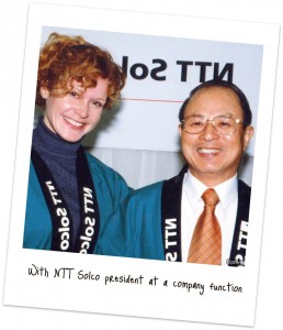 With the president of NTT Solco at the company's re-naming ceremony, 1999